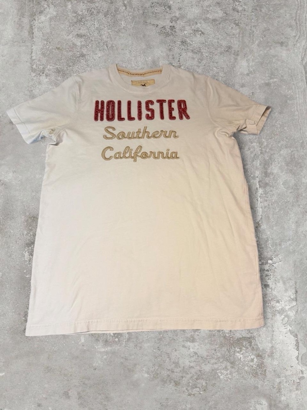 Hollister Cream Short Sleeve Tee with Red Logo and Tan Script